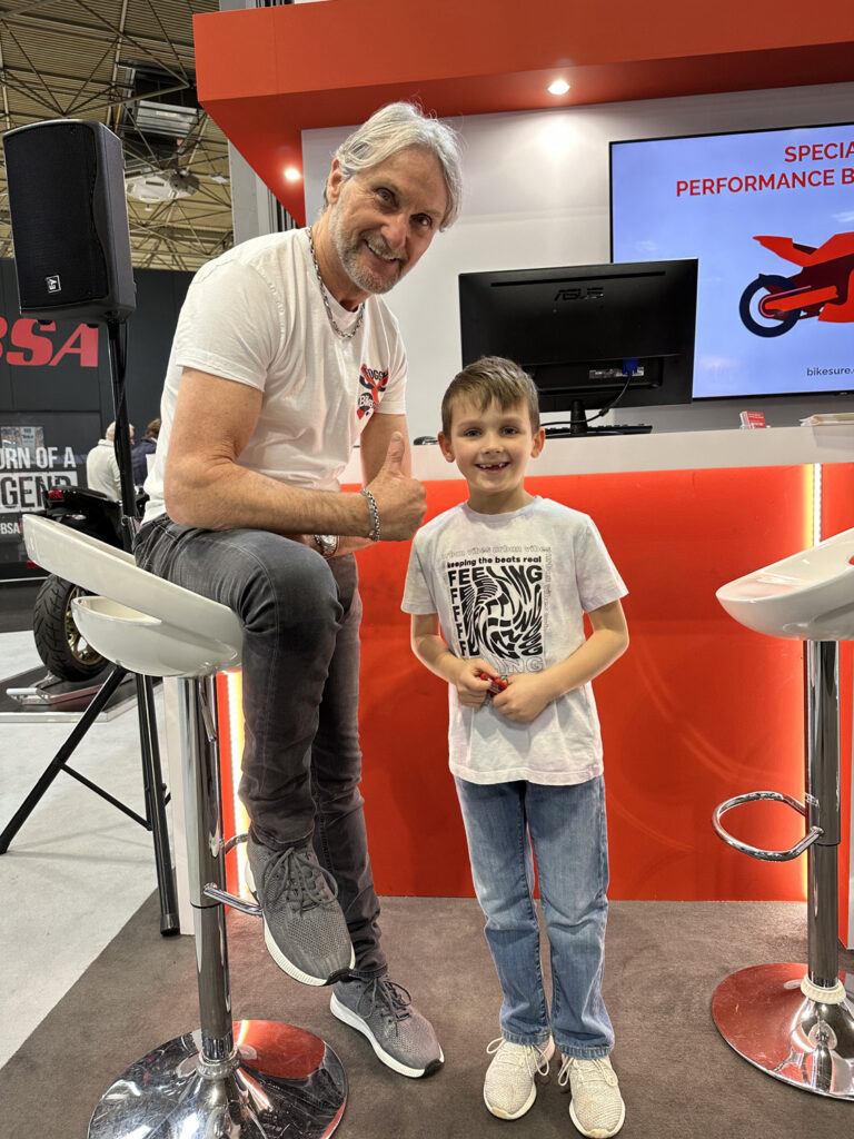 Carl Fogarty with a fan at Motorcycle Live