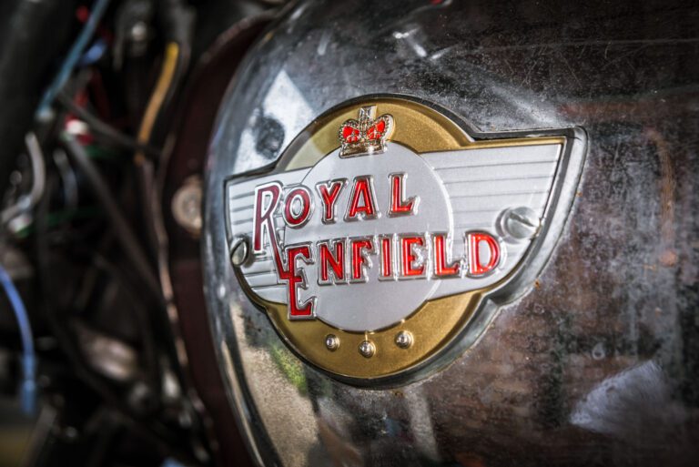 Close-up of Royal Enfield logo on bike