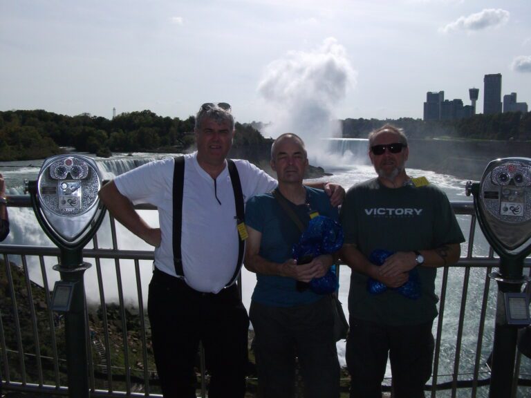 Steve (left) with friends in America