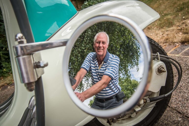 Lambretta owner Chris Phillips shown in the scooter's mirror