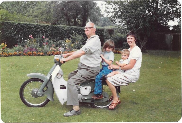 Colin on the Honda in 1980, with Robin's sister and her children.